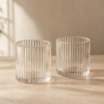 Photophores en verre strié, lot de deux, shown on a plain studio background