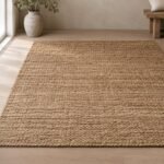 Tapis en jute tressée, 120 x 180 cm, shown on a plain studio background